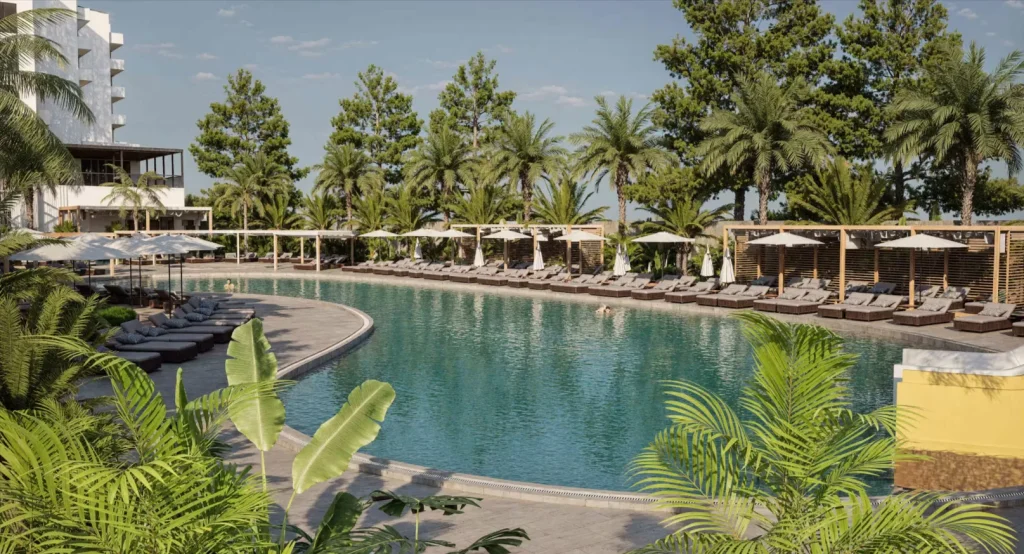 Gro&szlig;e Poolanlage im Calido Sol Hotel Okurcalar mit Sonnenliegen und Palmen